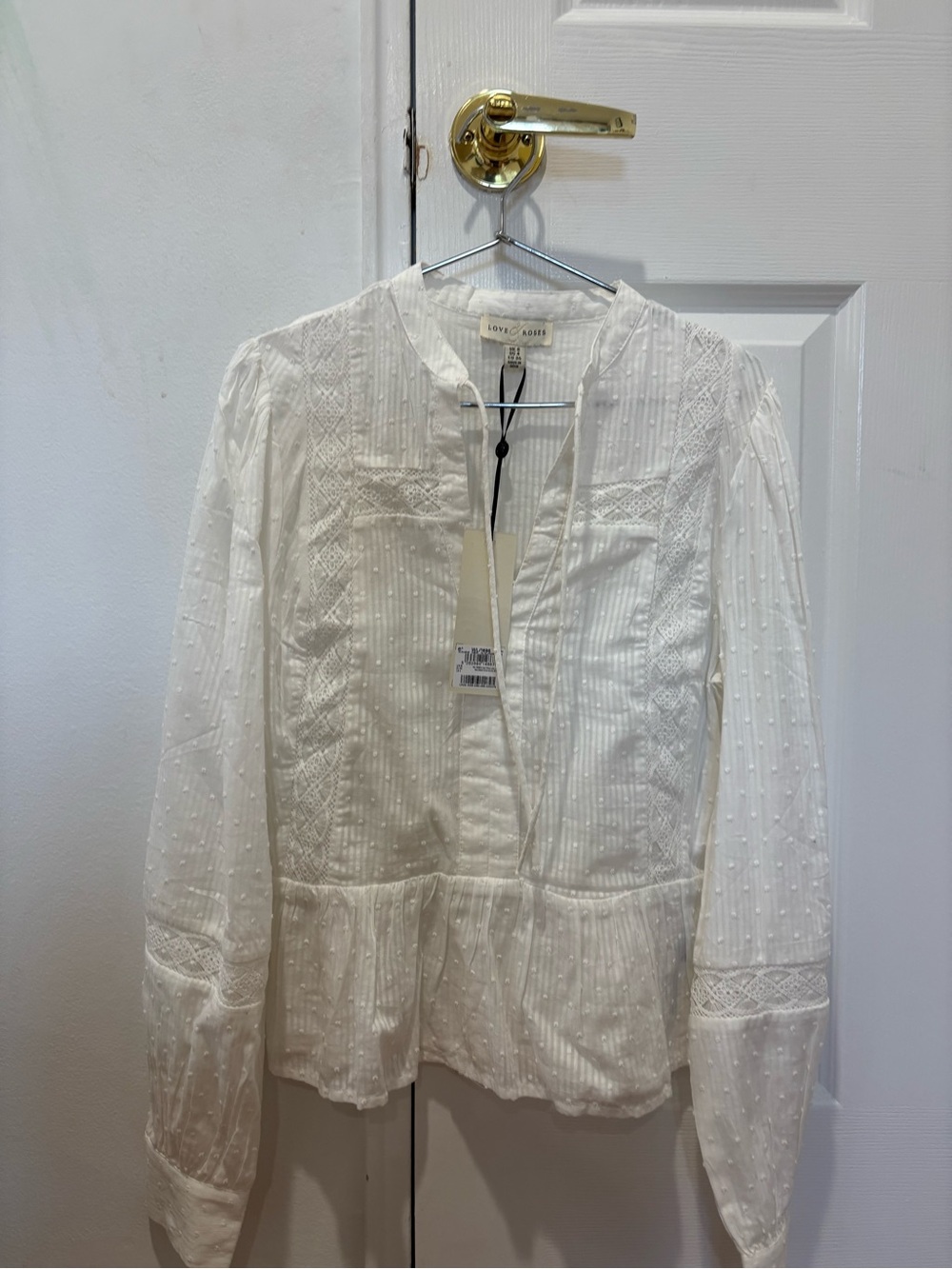 White Textured Peplum Blouse
